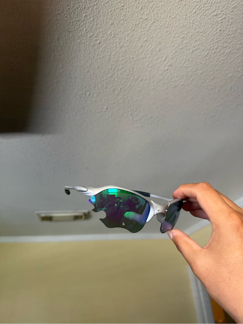 Silver Frame Sunglasses with Green Mirrored Lenses Oakleys